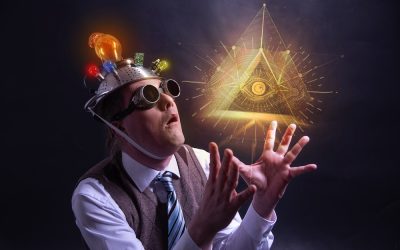 distraught looking conspiracy believer in suit with aluminum foil head and illuminati sign - eye pyramid
