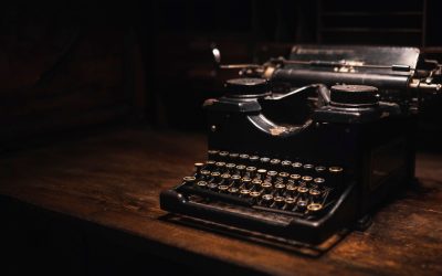 Old typewriter on a wooden table
